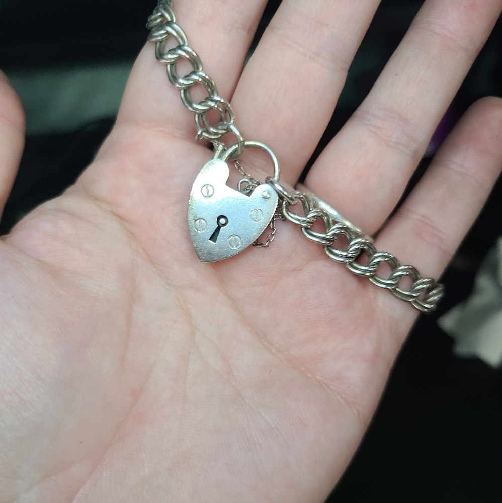 Heavy sterling silver lock bracelet with safety